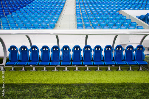 Blue bench or seat or chair of staff coach in the stadium of football