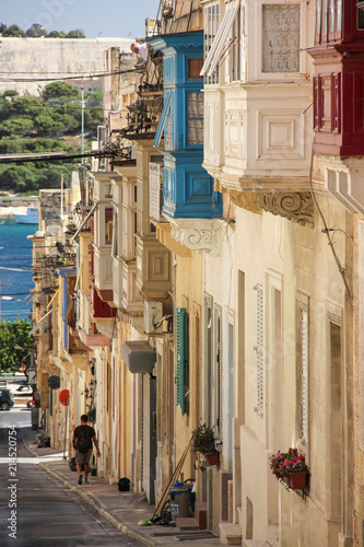 Street of Sliema with traditional maltese colorful balconies
