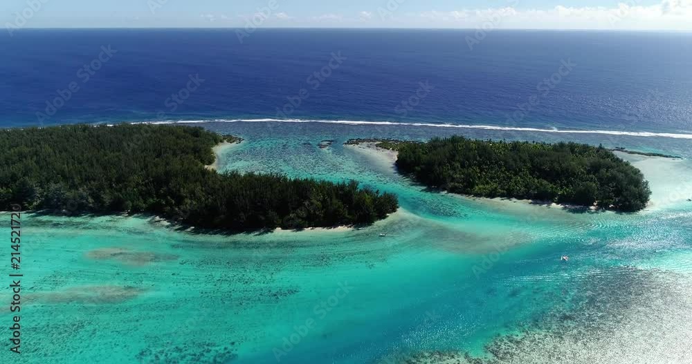 small islands (motu) in the middle of a lagoon in aerial view, French Polynesia small islands (motu) in the middle of a lagoon in aerial view, French Polynesia