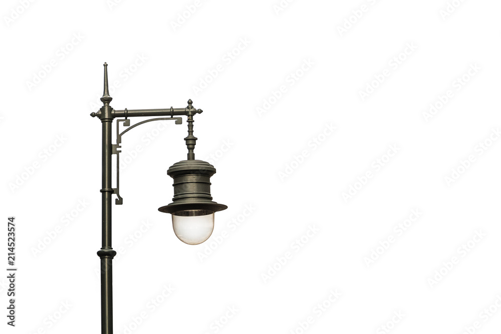 Black metal street lamp isolated on a white background. Background with copy space. Black metal street lamp isolated on a white background. Background with copy space.