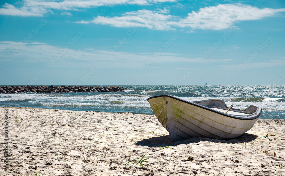 Boat on the sandy sunny beach. Stock photo. Boat on the sandy sunny beach. Stock photo.