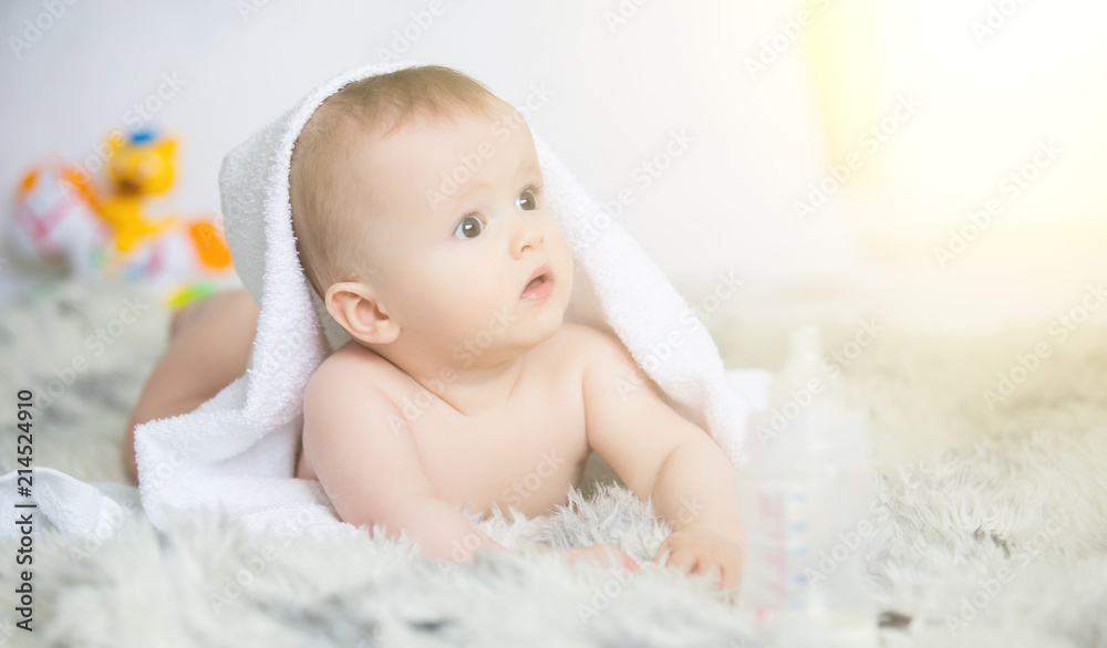 infant baby boy crawl with towel