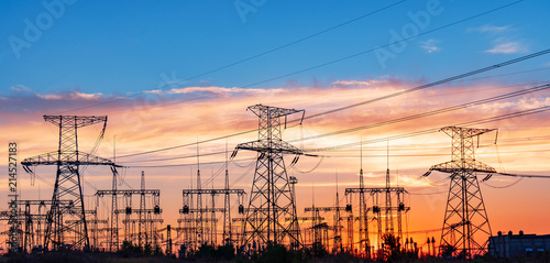 distribution electric substation with power lines and transformers. photo