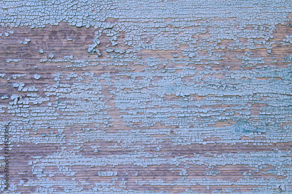 Old board with dried blue paint. Close-up. Horizontal view. Background. Texture.