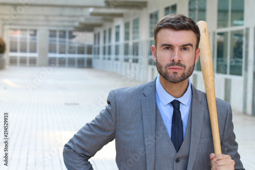Photography Angry businessman holding baseball bat
