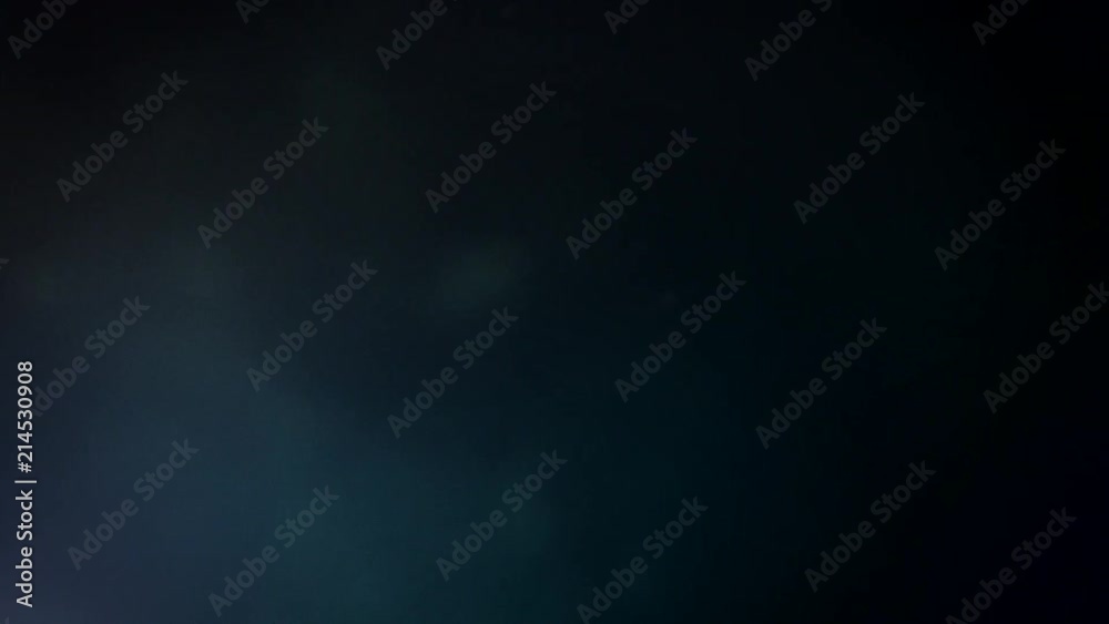 Defocused cinematic explosions in the black summer spring winter sky - beautiful bokeh in 4k UHD Defocused cinematic explosions in the black summer spring winter sky - beautiful bokeh in 4k UHD