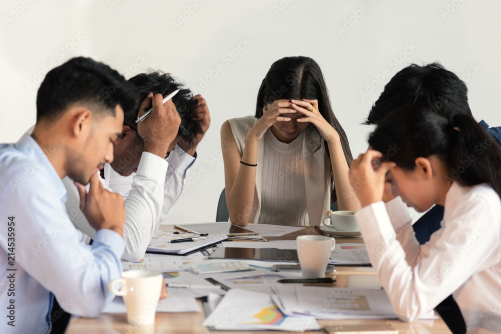 Business people yawning and being bored in the office Business people yawning and being bored in the office