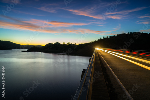 Long Exposure Headlights and Taillights over Don Pedro Lake Bridge at Sunset