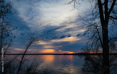 Sunrise over a lake © KCM Photography