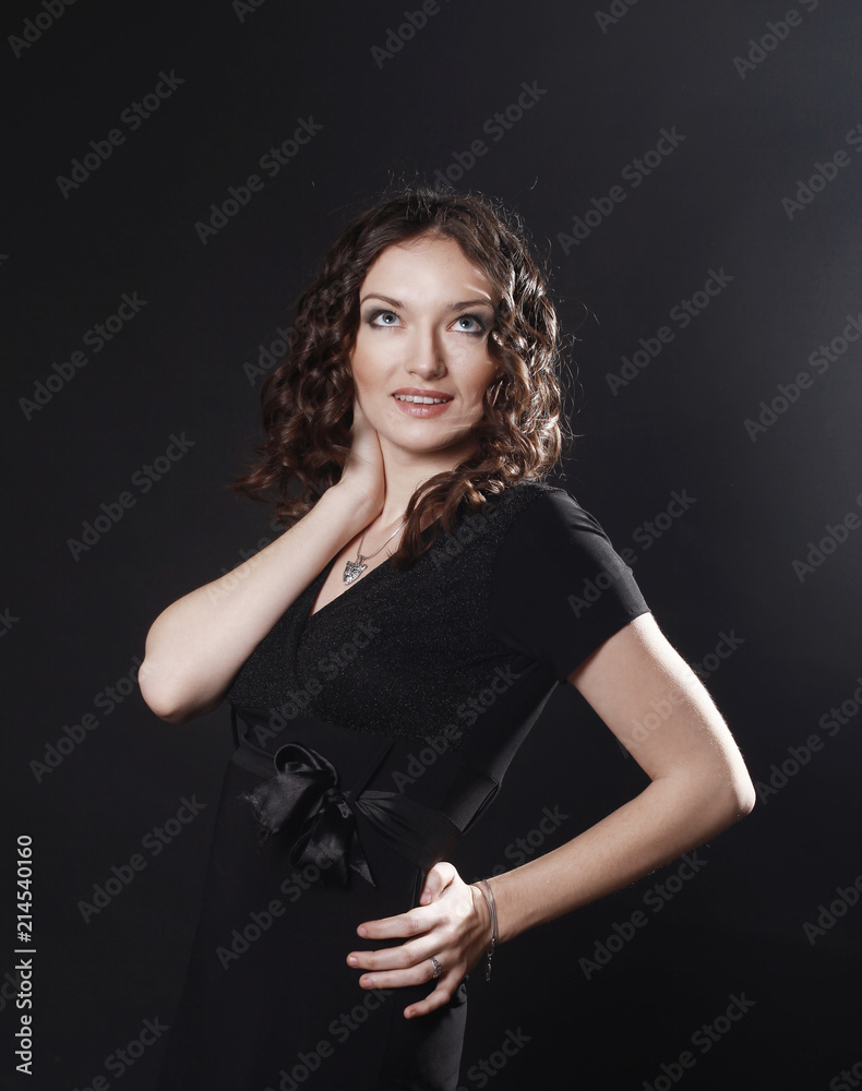 closeup of beautiful young woman in evening black dress