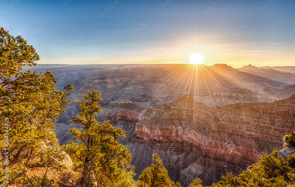 Sunrise. First Rays of Sun over Grand Canyon from Mather Point.