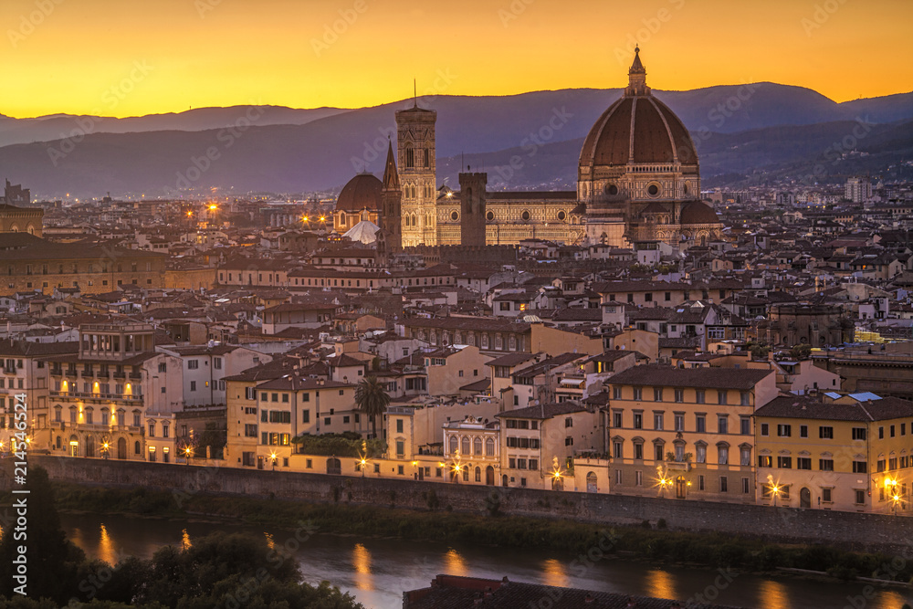 Looking out towards Florence, Italy and its land mark Duomo at sunset from the Piazzale Michelangelo