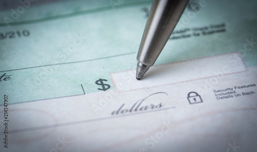 writing a check , making payments