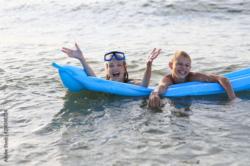 Two children in the sea © Evgenia Tiplyashina