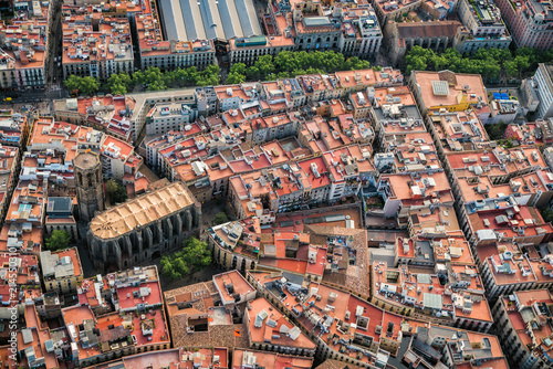 Aerial view of Barcelona Old Town narrow streets and famous La Rambla, Spain