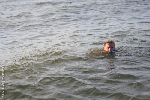 man dives into the sea