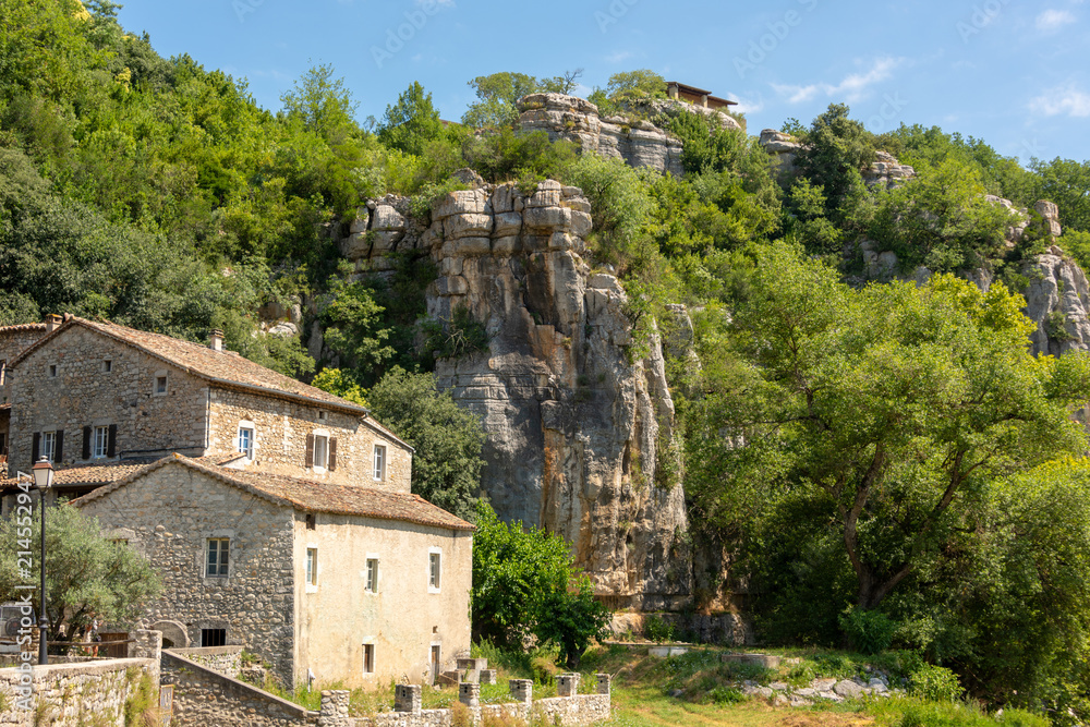 View of houses and rocks of the old historical village Labeaume on the river Ardeche in France