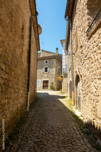 View into a small cobblestone alley in the medieval village Labeaume at the Ardeche in France