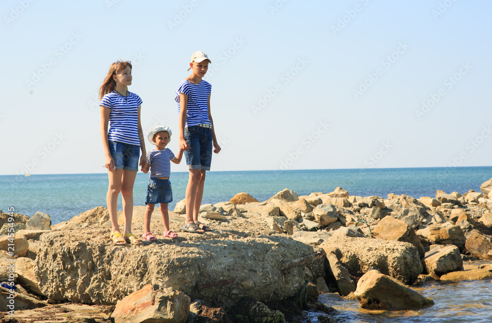 Three children on the beach