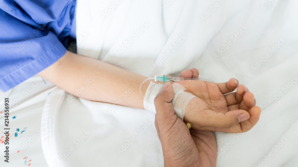 Fototapeta premium woman patients hand holder by his boy friend