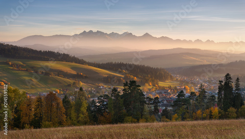 Autumn Landscape Of Poland Tatra Mountains. Beautiful View Of High Tatras And Picturesque Sunny Valley. Polish Rural Landscape With Tatry Mountain At Sunset.
