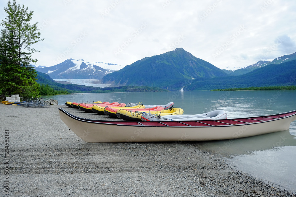 Canoes ready to be paddled across Mendenhall Lake to the glacier