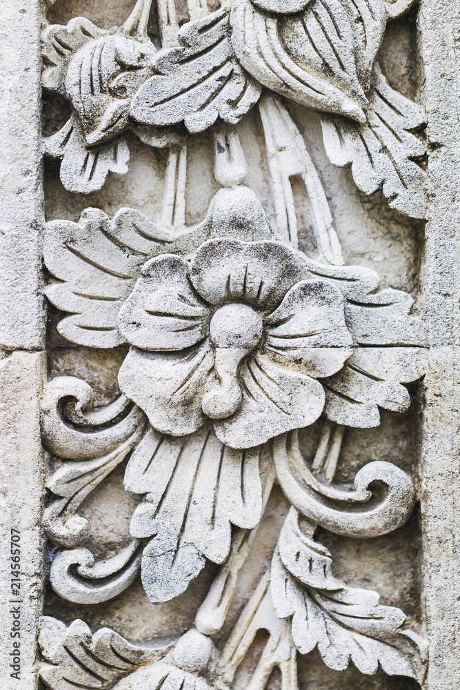 Traditional balinese stone carving, wall in temple