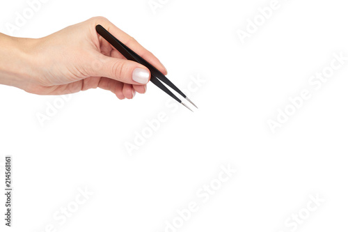 Black makeup tweezer with hand, isolated on white background, copy space template