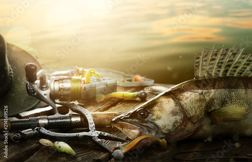 Happy Fishing background; Fishing tackle and trophy zander