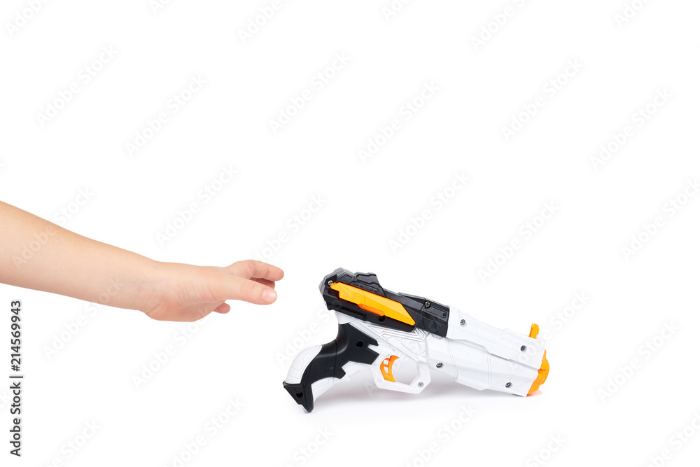 Naklejka premium Futuristic toy gun with kid hand, isolated on white background. copy space template