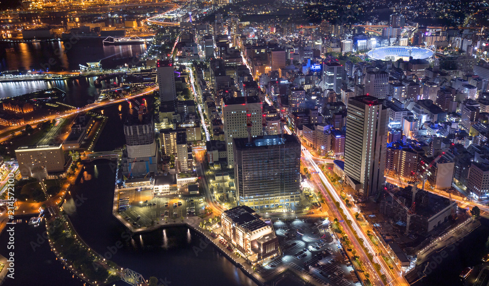 aerial view of waterfront buildings and traffic lights of Yokohama at night