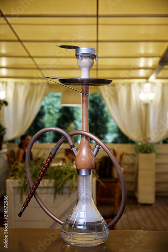 Hookah on the table in the summer restaurant.