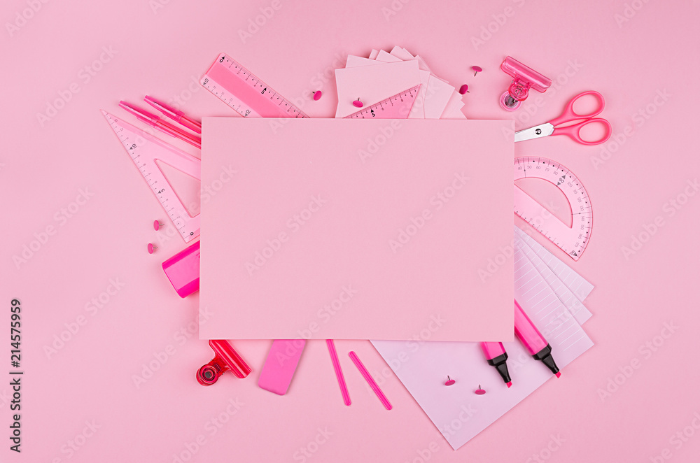 Different office supply and blank paper letterhead for text on pink color background, top view, copy space. Different office supply and blank paper letterhead for text on pink color background, top view, copy space.