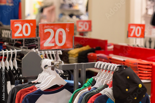 Shopping sale. seasonal discount on clothes in apparel shop store