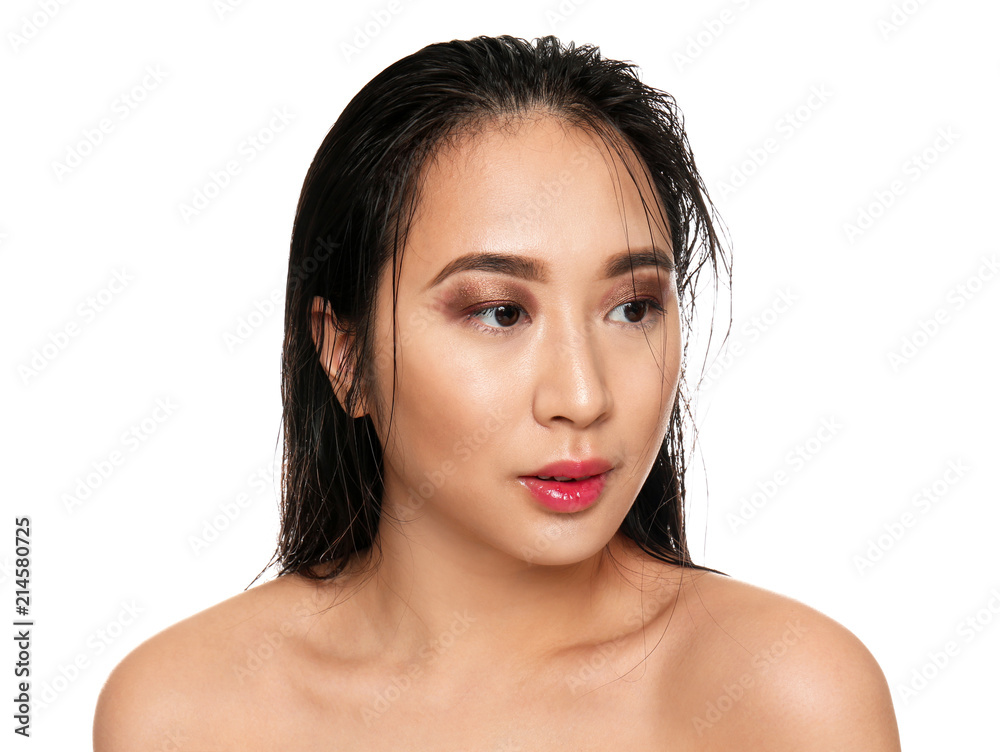Portrait of beautiful Asian woman on white background