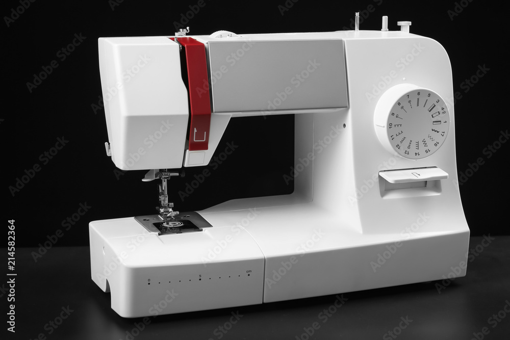 Sewing machine on dark background