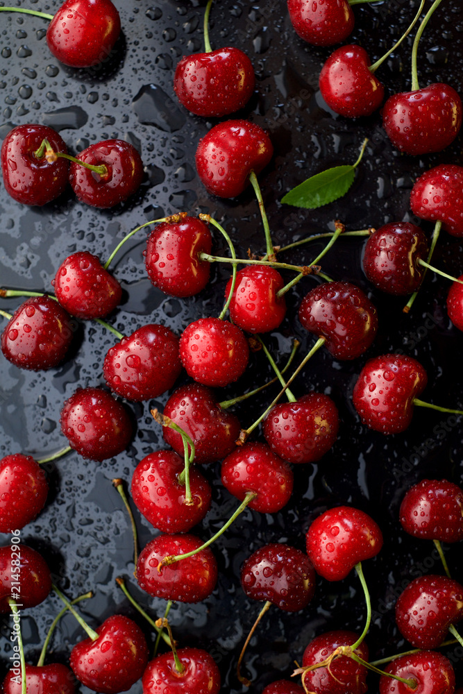 juicy sweet cherry on a black background juicy sweet cherry on a black background