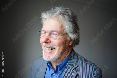 Quadro su tela Handsome Older Man - smiling, laughing, happy - relaxed, friendly