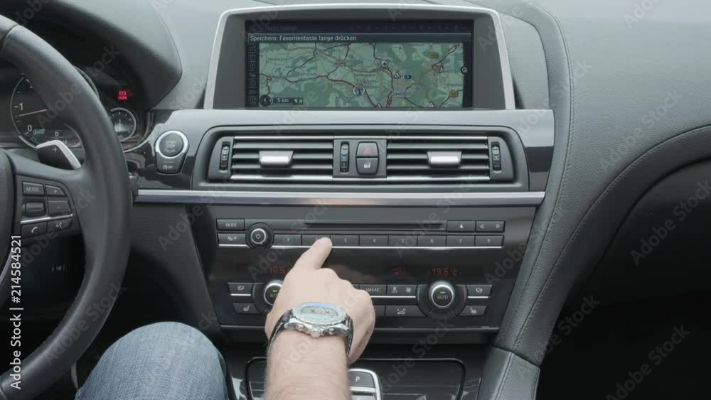 Hand operating luxury car navigation console