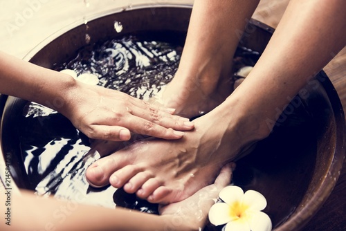 Closeup of feet cleaning at spa