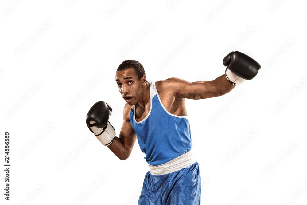 Sporty man during boxing exercise. Photo of boxer on white background