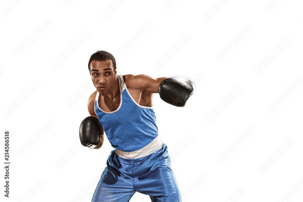 Sporty man during boxing exercise. Photo of boxer on white background