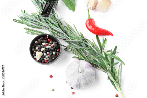 Fototapeta Naklejka Na Ścianę i Meble -  Composition with fresh and dry spices on white background