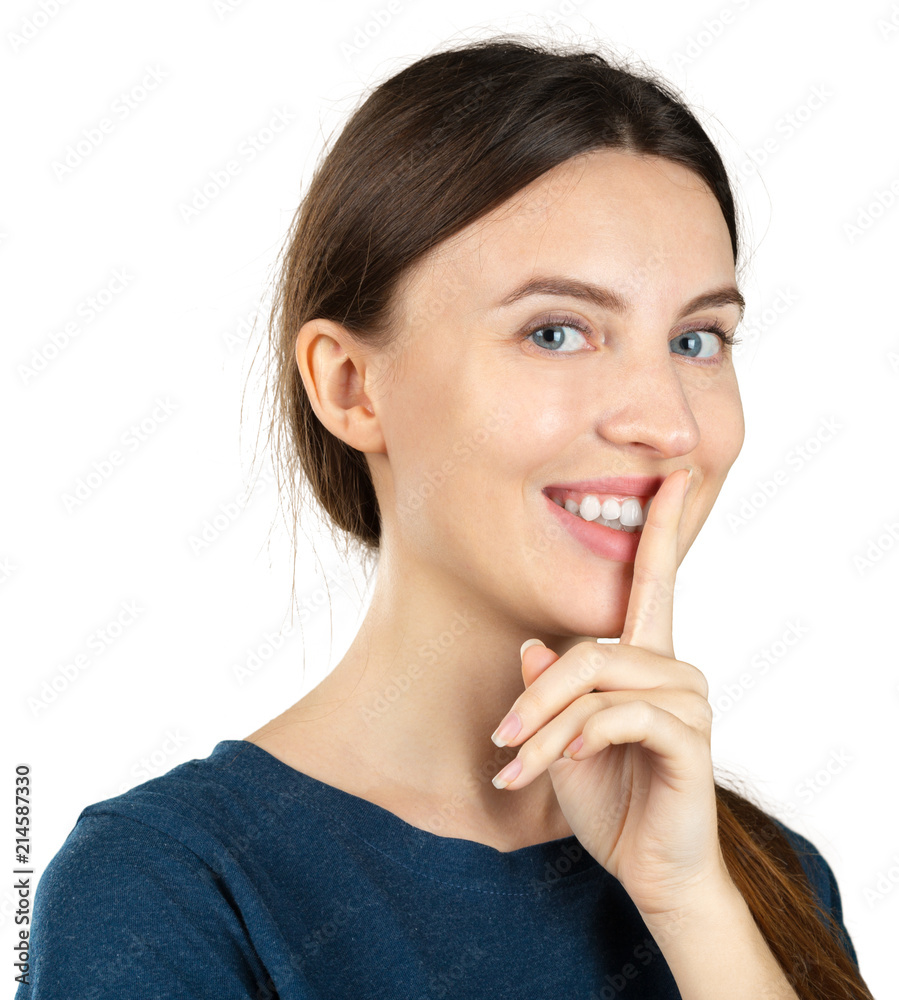 young woman making silence gesture young woman making silence gesture