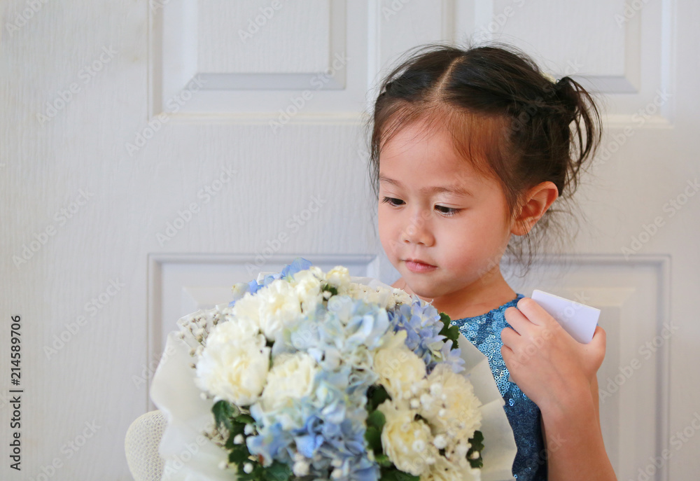Cute little Asian child girl with Bouquet of flowers. Cute little Asian child girl with Bouquet of flowers.