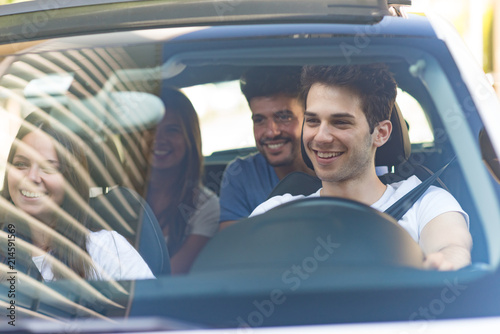 Group of friends on a car