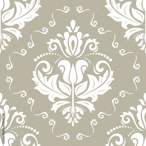 Classic seamless vector beije and white pattern. Damask orient ornament. Classic vintage background. Orient ornament for fabric, wallpaper and packaging