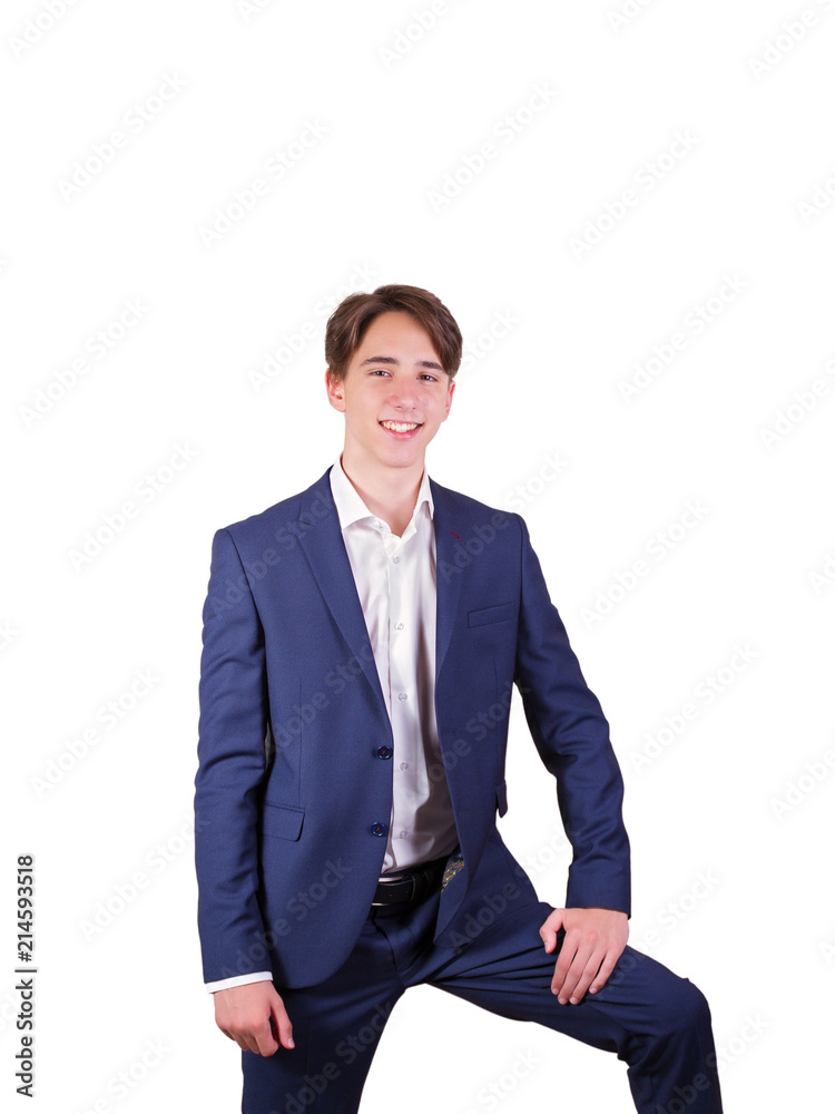 Studio portrait of teenage college student in suit. Portrait of elegant young man in suit, isolated on white background Studio portrait of teenage college student in suit. Portrait of elegant young man in suit, isolated on white background