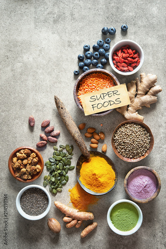 Various colorful superfoods in bowls © Alexander Raths