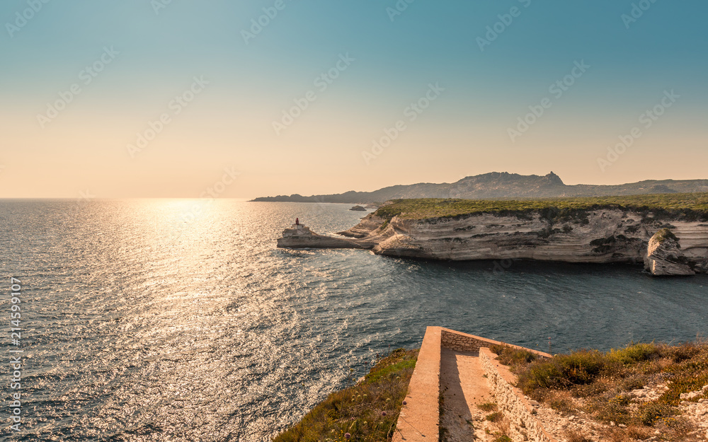 Evening sun on lighthouse at entrance to Bonifacio port Evening sun on lighthouse at entrance to Bonifacio port